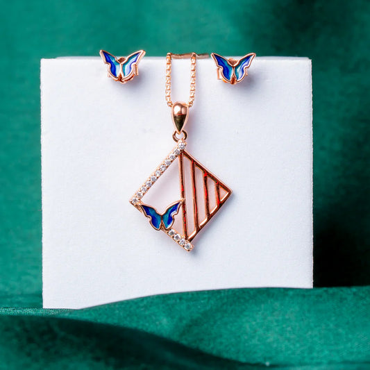 ROSE GOLD PLATED BUTTERFLY & CUBIC ZIRCONIA PENDANT SET WITH STUD EARRINGS