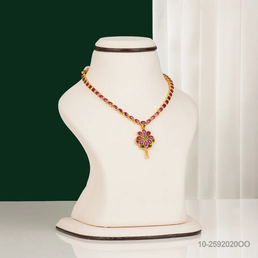 HAMSINI KUNDAN FLORAL DESIGN NECKLACE WITH RUBIES AND EMERALD