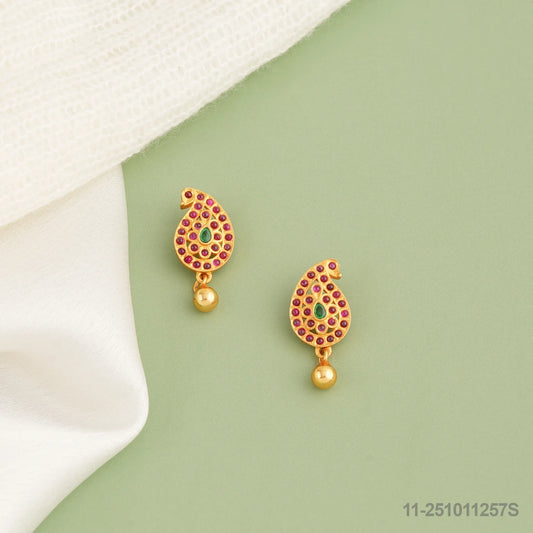 AKRUTI KUNDAN MANGO MOTIF EAR STUDS WITH RUBIES AND EMERALDS