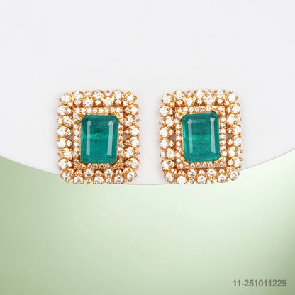 ANURADHA MOISSANITE EAR STUDS WITH EMERALDS