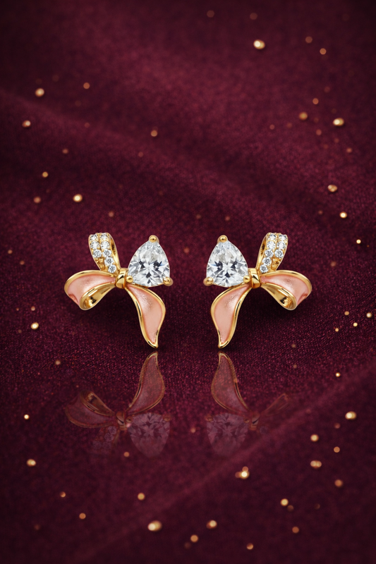 FABULOUS GOLD PLATED PINK COLOURED SILVER BOW EARRINGS