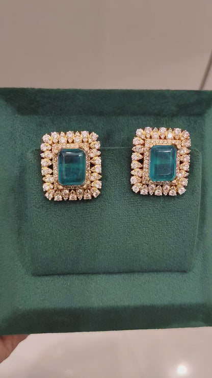 ANURADHA MOISSANITE EAR STUDS WITH EMERALDS