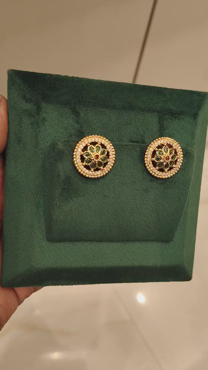 VAHINI KUNDAN FLORAL DESIGN EAR STUDS WITH EMERALDS AND RUBIES